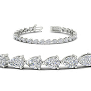10-carat-pear-shape-east-west-diamond-tennis-bracelet-in-platinum-FDBRC11577angle2-nl-wg.jpg?v=1776416388